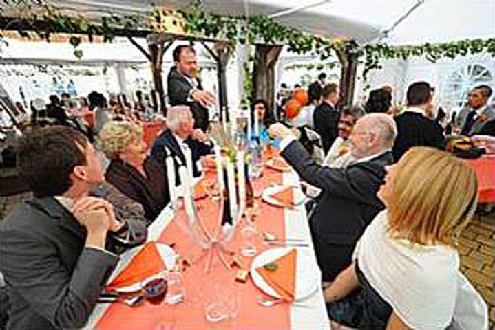 Speeches at a wedding dinner in the marquee